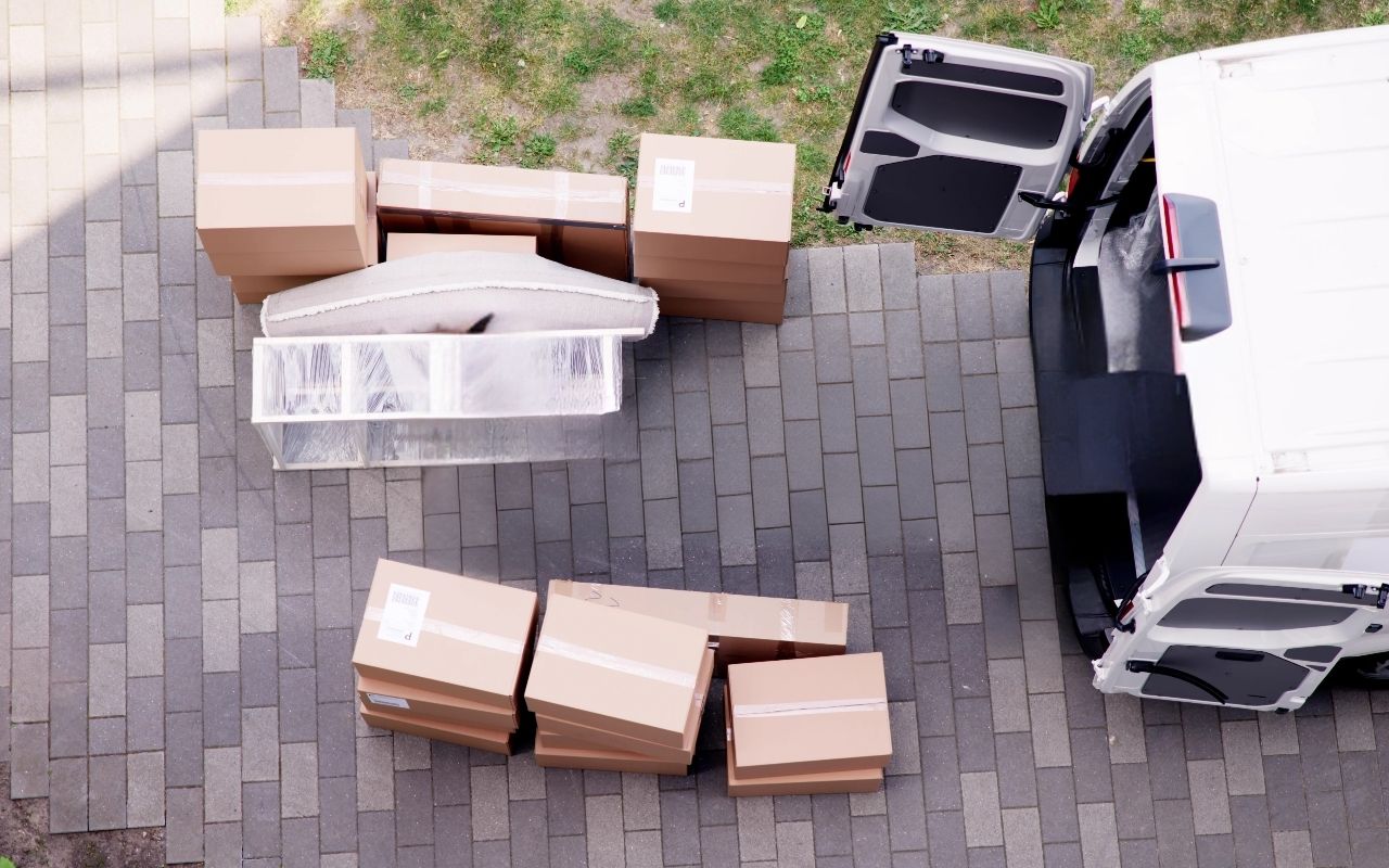Moving truck parked outside a home in San Mateo during a local move