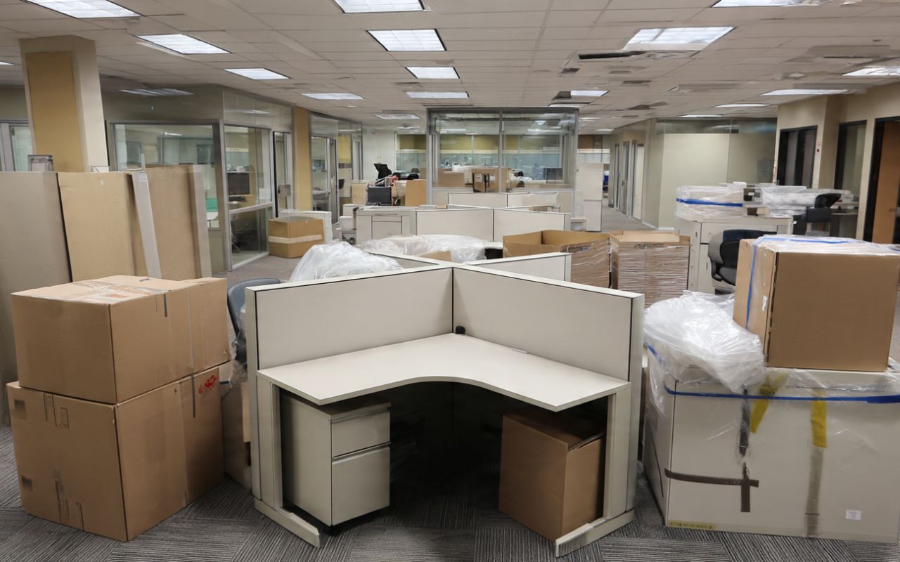 Small Office Movers in San Mateo preparing cubicles and desks for a smooth office relocation